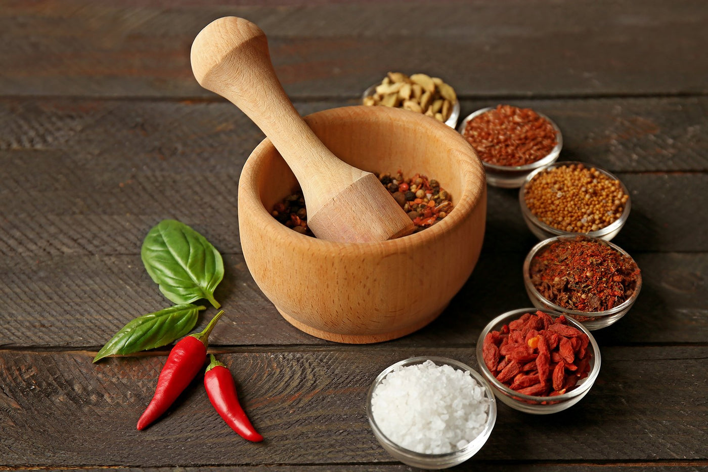 Pestle and Mortar with spices around 